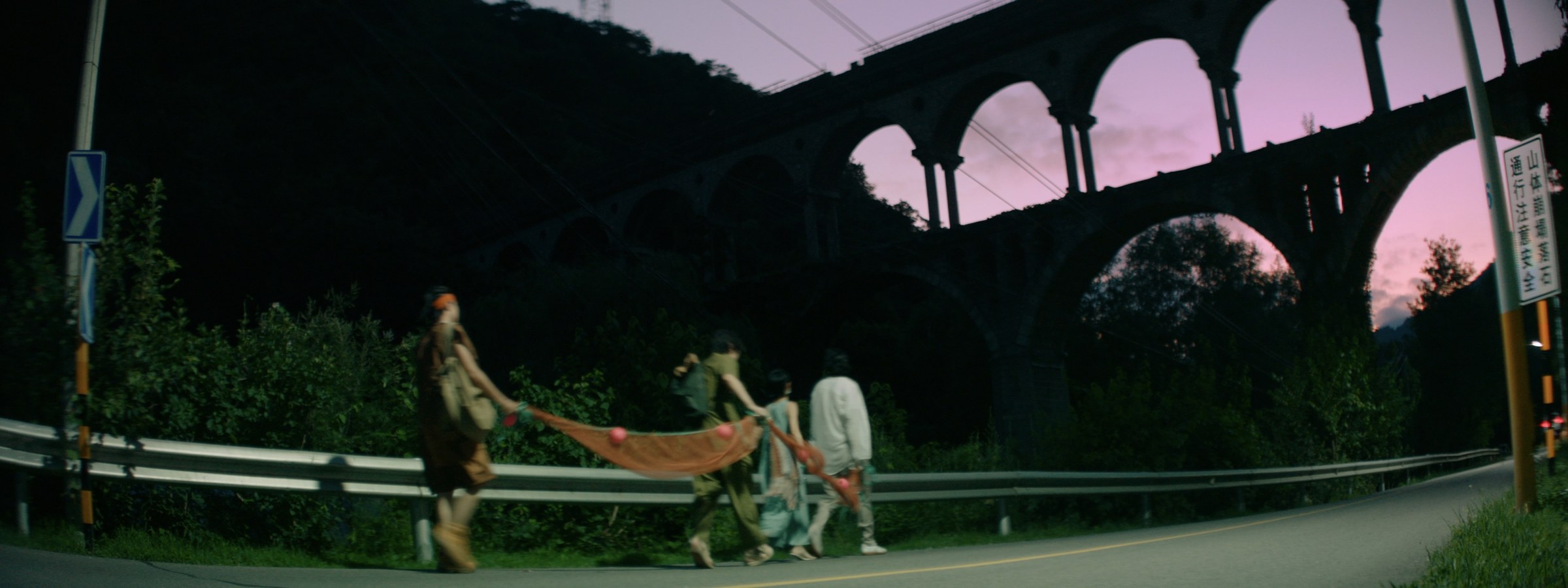 Night bridge scene with people